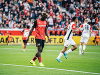 Victor Boniface of Bayer 04 Leverkusen reacts after missing a penalty during the Bundesliga match between Bayer 04 Leverkusen and Eintracht...