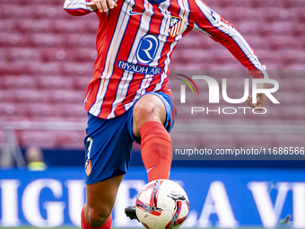 Antoine Griezmann of Atletico de Madrid is in action with the ball during the La Liga EA Sports 2024/25 football match between Atletico de M...