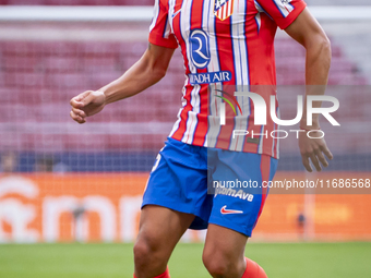 Nahuel Molina of Atletico de Madrid is in action with the ball during the La Liga EA Sports 2024/25 football match between Atletico de Madri...