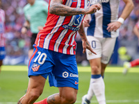 Angel Correa of Atletico de Madrid is in action with the ball during the La Liga EA Sports 2024/25 football match between Atletico de Madrid...