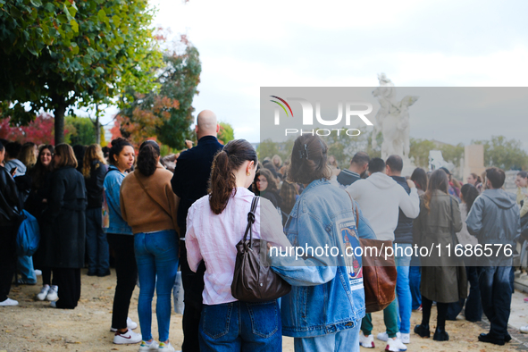 One Direction fans gather in Paris, France, to pay tribute to Liam Payne. 