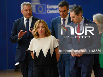 Italy's Prime Minister Giorgia Meloni (L) and Ireland's Prime Minister Simon Harris (R) discuss economy and competitiveness issues, a Ukrain...