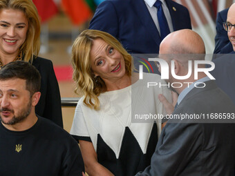 Italy's Prime Minister Giorgia Meloni stands before the family photo. EU leaders discuss economy and competitiveness issues, Ukraine victory...