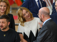 Italy's Prime Minister Giorgia Meloni stands before the family photo. EU leaders discuss economy and competitiveness issues, Ukraine victory...