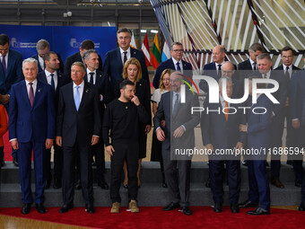 Ukraine's president Volodymyr Zelensky stands prior to the family photo. He is surrounded by EU leaders, discussing economy and competitiven...