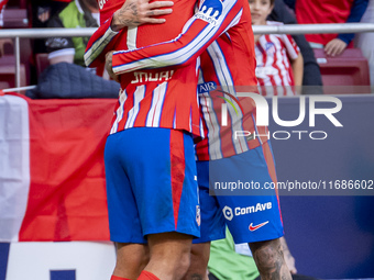 Antoine Griezmann of Atletico de Madrid (L) celebrates his goal by hugging Rodrigo De Paul of Atletico de Madrid (R) during the La Liga EA S...