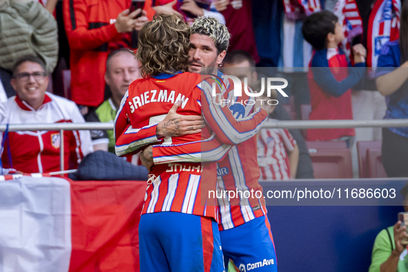 Antoine Griezmann of Atletico de Madrid (L) celebrates his goal by hugging Rodrigo De Paul of Atletico de Madrid (R) during the La Liga EA S...