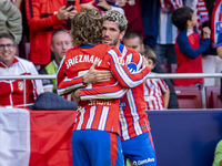 Antoine Griezmann of Atletico de Madrid (L) celebrates his goal by hugging Rodrigo De Paul of Atletico de Madrid (R) during the La Liga EA S...