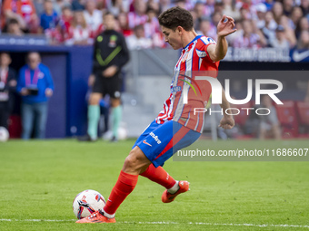 Julian Alvarez of Atletico de Madrid attempts a kick during the La Liga EA Sports 2024/25 football match between Atletico de Madrid and CD L...