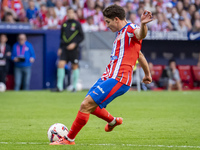 Julian Alvarez of Atletico de Madrid attempts a kick during the La Liga EA Sports 2024/25 football match between Atletico de Madrid and CD L...