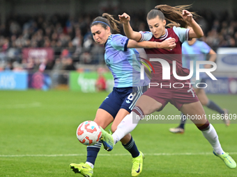 Mariona Caldentey (8 Arsenal) and Seraina Piubel (77 West Ham) challenge for the ball during the Barclays FA Women's Super League match betw...