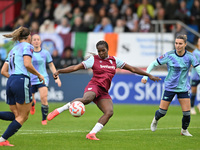 Viviane Assey (20 West Ham) shoots during the Barclays FA Women's Super League match between West Ham United and Arsenal at the Chigwell Con...