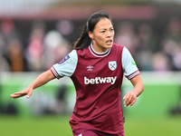 Li Mengwen (26 West Ham) goes forward during the Barclays FA Women's Super League match between West Ham United and Arsenal at the Chigwell...