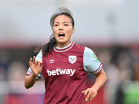 Li Mengwen (26 West Ham) looks on during the Barclays FA Women's Super League match between West Ham United and Arsenal at the Chigwell Cons...