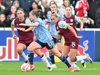 Kim Little (10 Arsenal) goes forward during the Barclays FA Women's Super League match between West Ham United and Arsenal at the Chigwell C...