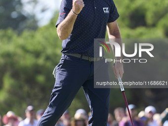 Julien Guerrier of France celebrates a par putt on the 18th green, leading to a play-off, during day four of the Estrella Damm N.A. Andaluci...