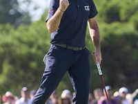 Julien Guerrier of France celebrates a par putt on the 18th green, leading to a play-off, during day four of the Estrella Damm N.A. Andaluci...