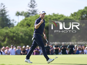 Julien Guerrier of France celebrates a par putt on the 18th green, leading to a play-off, during day four of the Estrella Damm N.A. Andaluci...