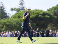 Julien Guerrier of France celebrates a par putt on the 18th green, leading to a play-off, during day four of the Estrella Damm N.A. Andaluci...