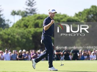 Julien Guerrier of France celebrates a par putt on the 18th green, leading to a play-off, during day four of the Estrella Damm N.A. Andaluci...