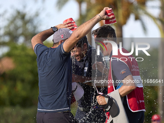 Julien Guerrier of France celebrates victory on the 18th green, on the ninth play-off hole, during day four of the Estrella Damm N.A. Andalu...