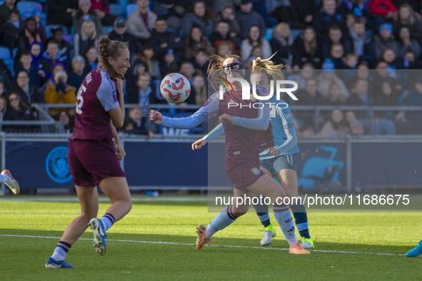 Anna Patten #4 of Aston Villa W.F.C is tackled by Lauren Hemp #11 of Manchester City W.F.C during the Barclays FA Women's Super League match...