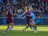 Anna Patten #4 of Aston Villa W.F.C is tackled by Lauren Hemp #11 of Manchester City W.F.C during the Barclays FA Women's Super League match...