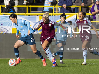 Aoba Fujino #20 of Manchester City W.F.C. is challenged by Rachel Daly #9 of Aston Villa W.F.C during the Barclays FA Women's Super League m...