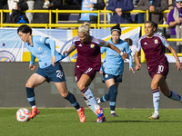 Aoba Fujino #20 of Manchester City W.F.C. is challenged by Rachel Daly #9 of Aston Villa W.F.C during the Barclays FA Women's Super League m...