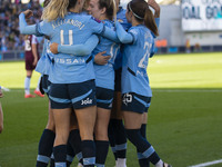 Jill Roord #10 of Manchester City W.F.C. celebrates her goal with teammates during the Barclays FA Women's Super League match between Manche...