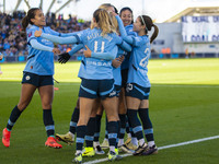 Jill Roord #10 of Manchester City W.F.C. celebrates her goal with teammates during the Barclays FA Women's Super League match between Manche...