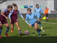 Lauren Hemp #11 of Manchester City W.F.C. is in action during the Barclays FA Women's Super League match between Manchester City and Aston V...