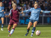 Alex Greenwood, number 5 of Manchester City W.F.C., is in possession of the ball during the Barclays FA Women's Super League match between M...