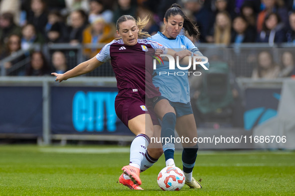 Leila Ouahabi #15 of Manchester City W.F.C. challenges the opponent during the Barclays FA Women's Super League match between Manchester Cit...