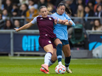 Leila Ouahabi #15 of Manchester City W.F.C. challenges the opponent during the Barclays FA Women's Super League match between Manchester Cit...