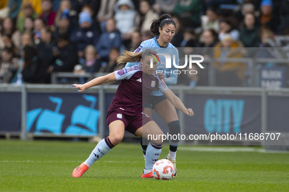 Leila Ouahabi #15 of Manchester City W.F.C. challenges the opponent during the Barclays FA Women's Super League match between Manchester Cit...