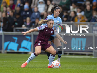 Leila Ouahabi #15 of Manchester City W.F.C. challenges the opponent during the Barclays FA Women's Super League match between Manchester Cit...