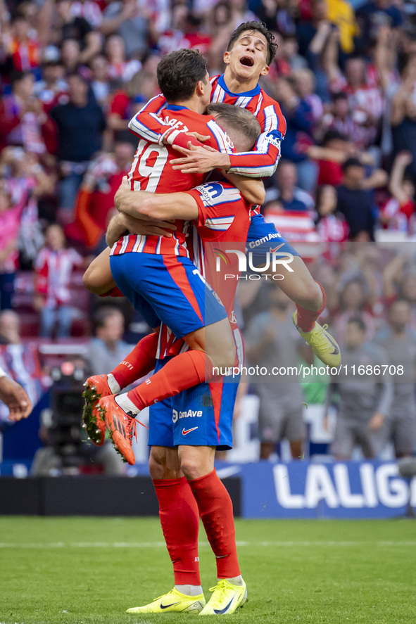 Alexander Sorloth of Atletico de Madrid (C) celebrates his goal with Julian Alvarez (L) and Giuliano Simeone (R) during the La Liga EA Sport...