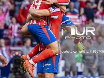 Alexander Sorloth of Atletico de Madrid (C) celebrates his goal with Julian Alvarez (L) and Giuliano Simeone (R) during the La Liga EA Sport...