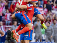 Alexander Sorloth of Atletico de Madrid (C) celebrates his goal with Julian Alvarez (L) and Giuliano Simeone (R) during the La Liga EA Sport...