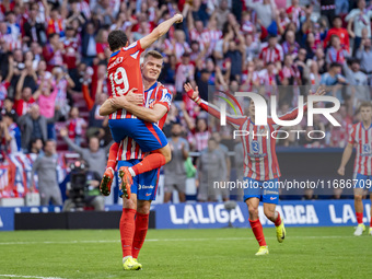 Alexander Sorloth of Atletico de Madrid (C) celebrates his goal with Julian Alvarez (L) and Giuliano Simeone (R) during the La Liga EA Sport...