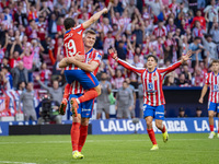 Alexander Sorloth of Atletico de Madrid (C) celebrates his goal with Julian Alvarez (L) and Giuliano Simeone (R) during the La Liga EA Sport...