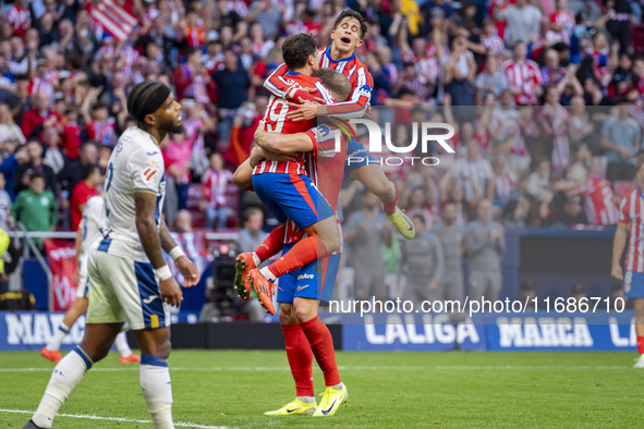 Alexander Sorloth of Atletico de Madrid (C) celebrates his goal with Julian Alvarez (L) and Giuliano Simeone (R) during the La Liga EA Sport...