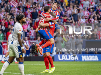 Alexander Sorloth of Atletico de Madrid (C) celebrates his goal with Julian Alvarez (L) and Giuliano Simeone (R) during the La Liga EA Sport...