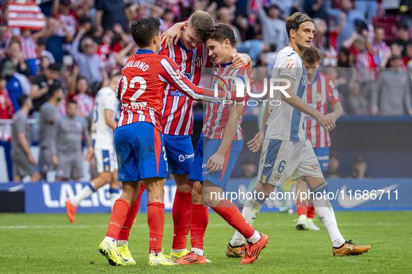 Alexander Sorloth of Atletico de Madrid (C) celebrates his goal with Julian Alvarez (R) and Giuliano Simeone (L) during the La Liga EA Sport...