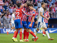 Alexander Sorloth of Atletico de Madrid (C) celebrates his goal with Julian Alvarez (R) and Giuliano Simeone (L) during the La Liga EA Sport...