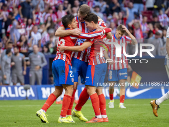 Alexander Sorloth of Atletico de Madrid (C) celebrates his goal with Julian Alvarez (R) and Giuliano Simeone (L) during the La Liga EA Sport...