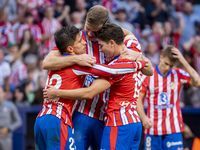 Alexander Sorloth of Atletico de Madrid (C) celebrates his goal with Julian Alvarez (R) and Giuliano Simeone (L) during the La Liga EA Sport...