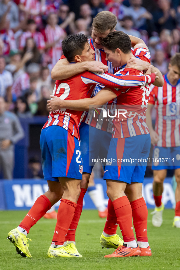 Alexander Sorloth of Atletico de Madrid (C) celebrates his goal with Julian Alvarez (R) and Giuliano Simeone (L) during the La Liga EA Sport...