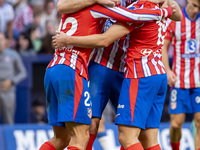 Alexander Sorloth of Atletico de Madrid (C) celebrates his goal with Julian Alvarez (R) and Giuliano Simeone (L) during the La Liga EA Sport...